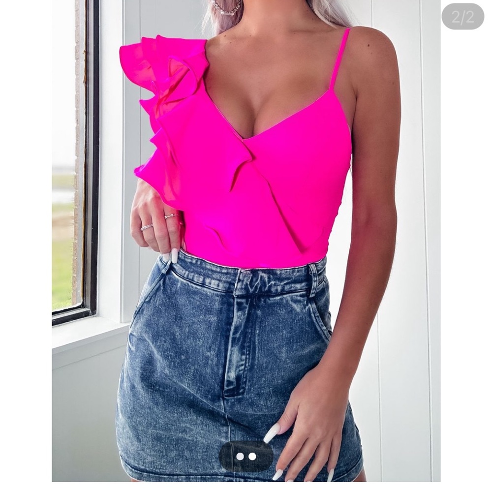 Bright pink body suit